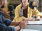 Man and women doing a radio interview